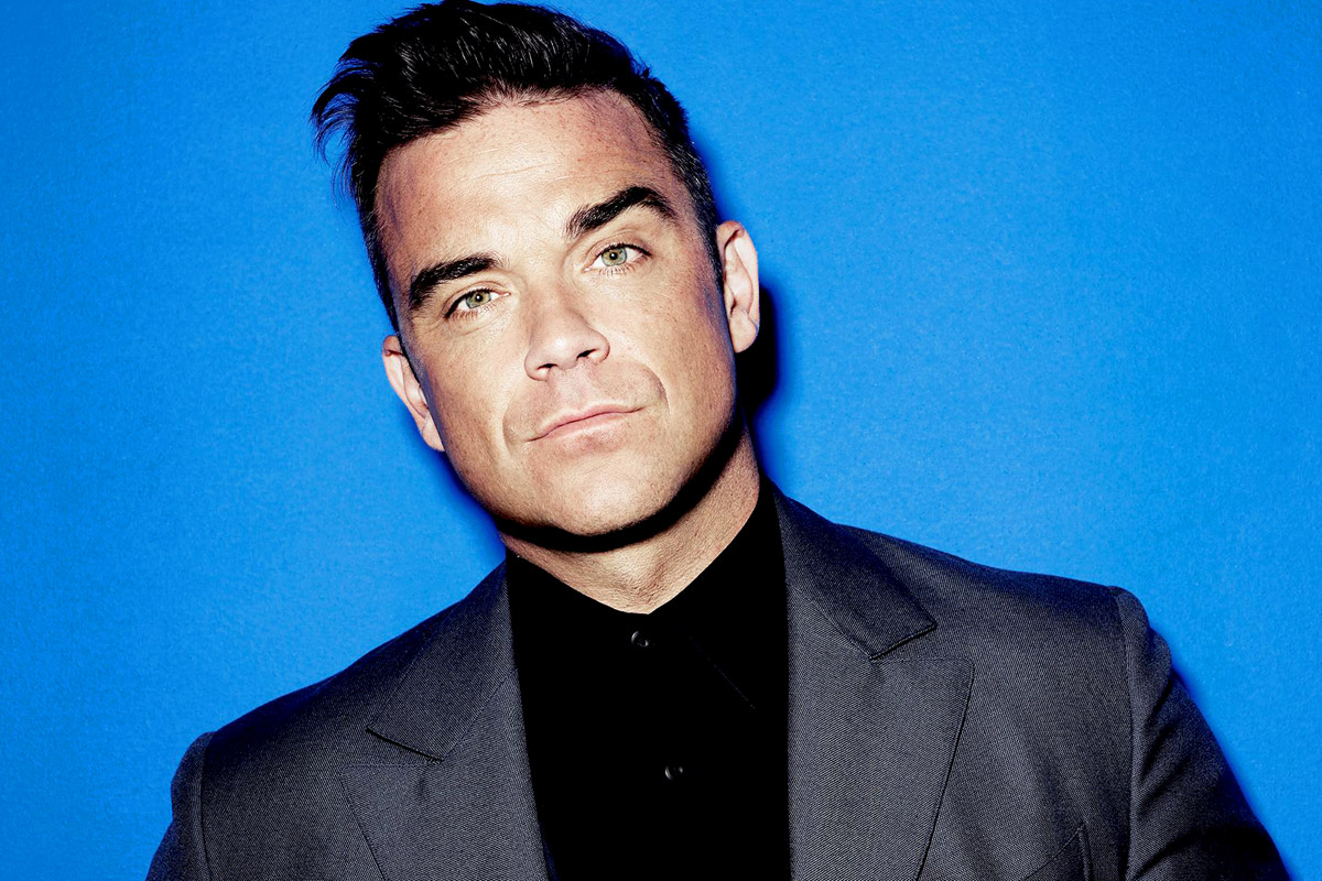 VIDEO: Robbie Williams anunță unde cântă în turneul „Let Me Entertain You din 2015