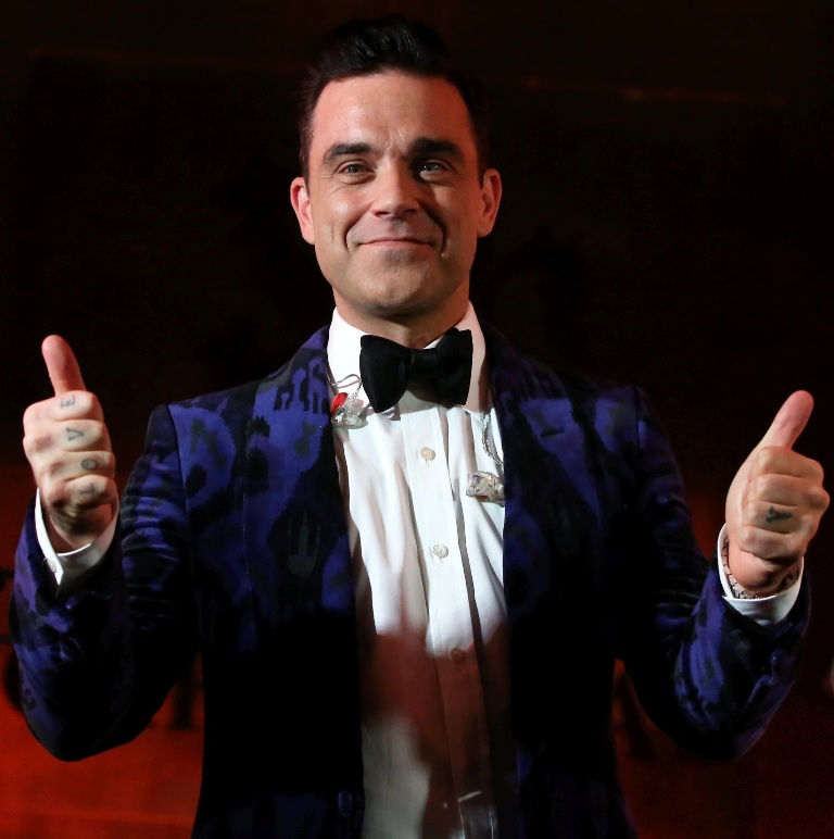 TOP 10 întrebări care l-ar surprinde pe Robbie Williams