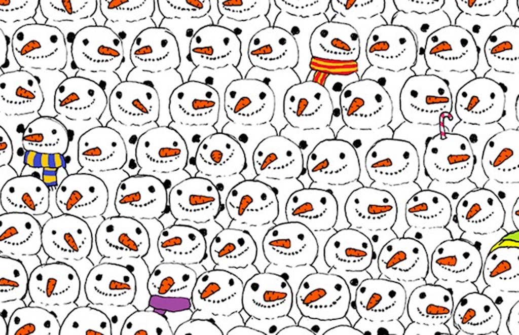 Găsești ursul panda care stă între oamenii de zăpadă?