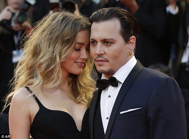 OMG! Johnny Depp ar putea ajunge la închisoare din cauza fostei soții
