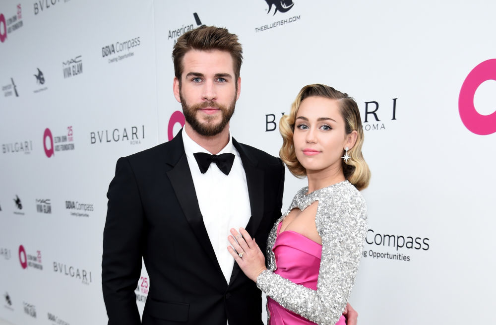 FOTO: Miley Cyrus și Liam Hemsworth au refăcut poza de la Oscaruri, după șase ani