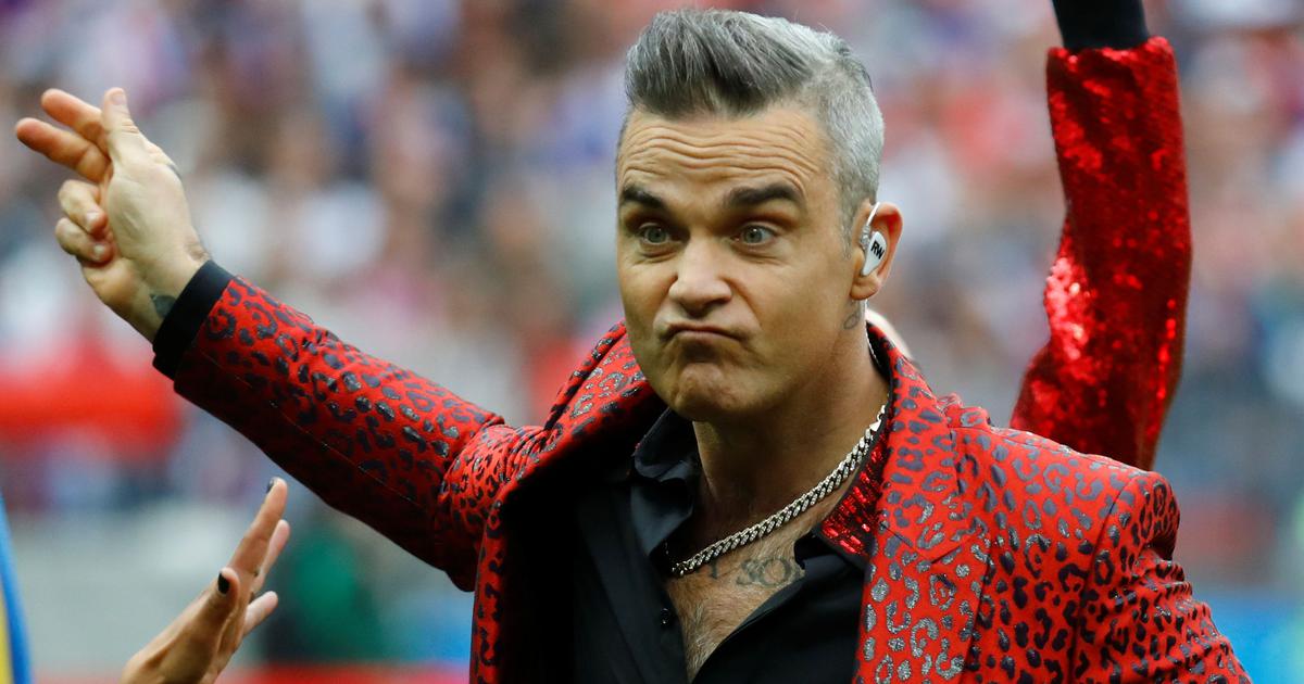 FOX TV și-a cerut scuze pentru GESTUL OBSCEN făcut de Robbie Williams în deschiderea Cupei Mondiale